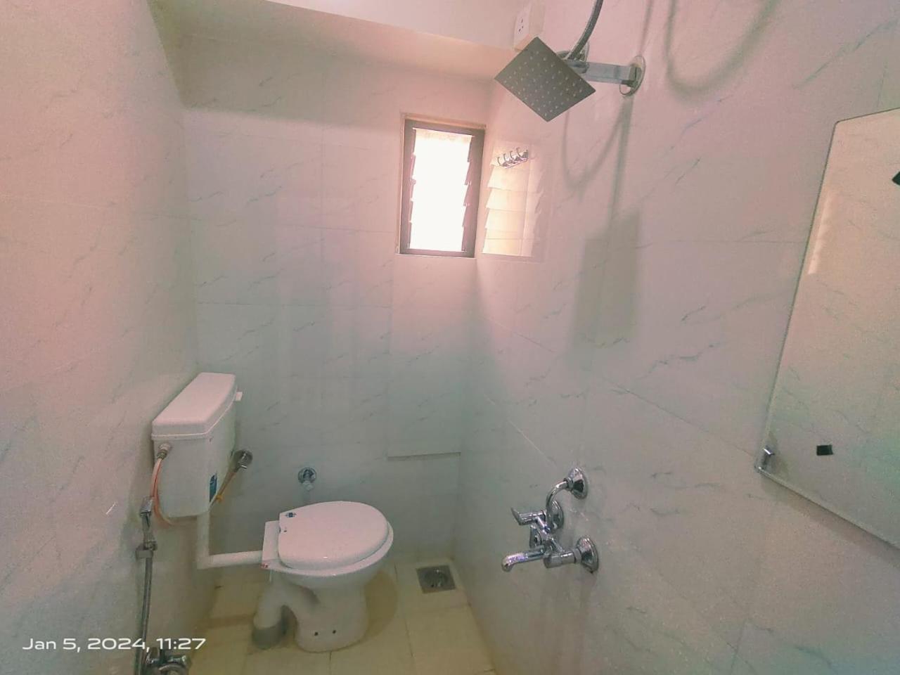 Amrit Guest House Пуна Экстерьер фото